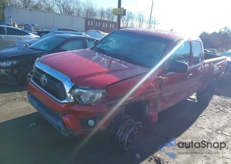 2015 Toyota Tacoma Base V6 z USA, uszkodzony, nr VIN 5TFUU4EN0FX124268